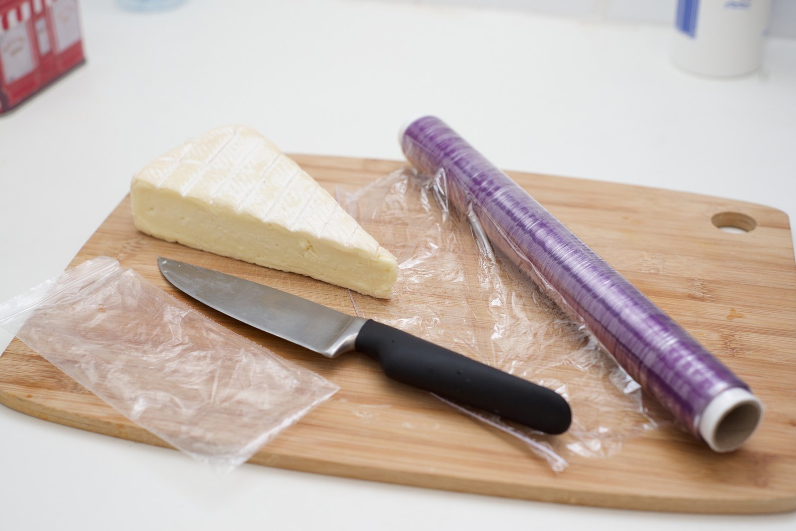 brie cheese in cling wrap for freezing