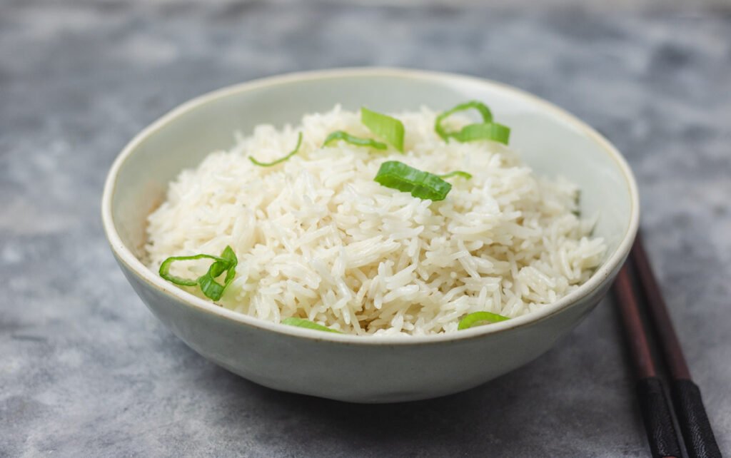 cooked rice in bowl with spring onions-kookybakes.com