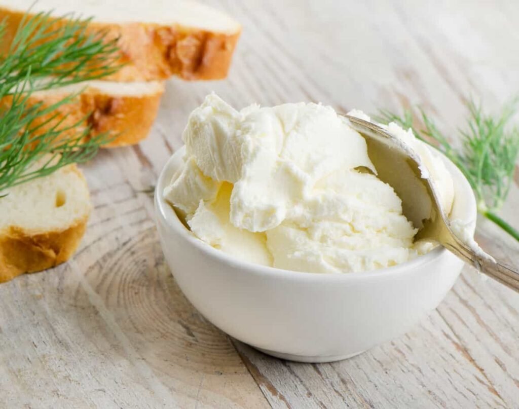 cream_cheese in bowl with spoon for serving-kookybakes.com