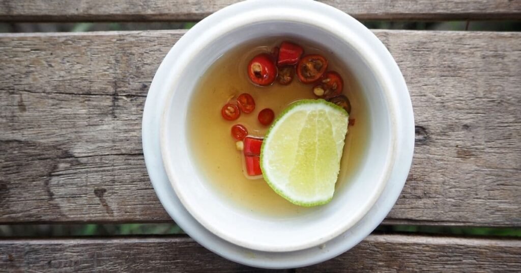 fish-sauce with lime and red chili in bowl