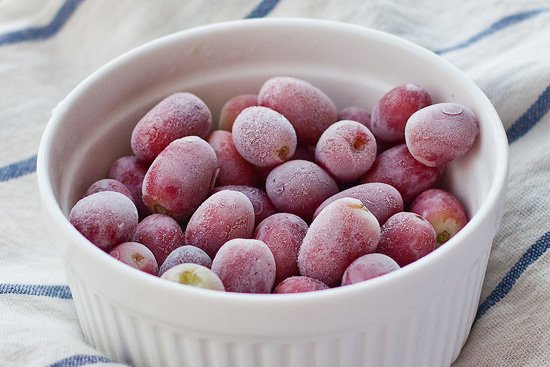 frozen red grapes in bowl-kookybakes.com