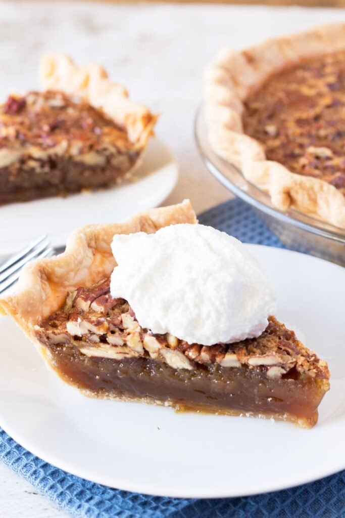 Slice-of-Maple-Pecan-Pie served with ice cream-kookybakes.com