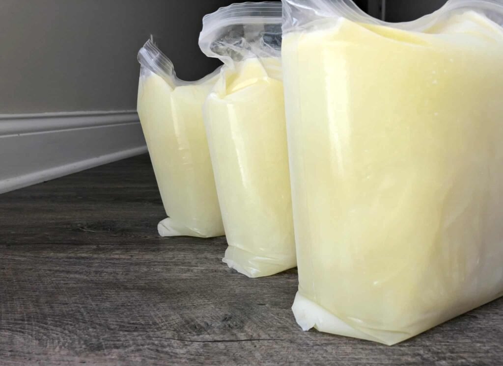 freezing milk in freezer bags easily-kookybakes.com