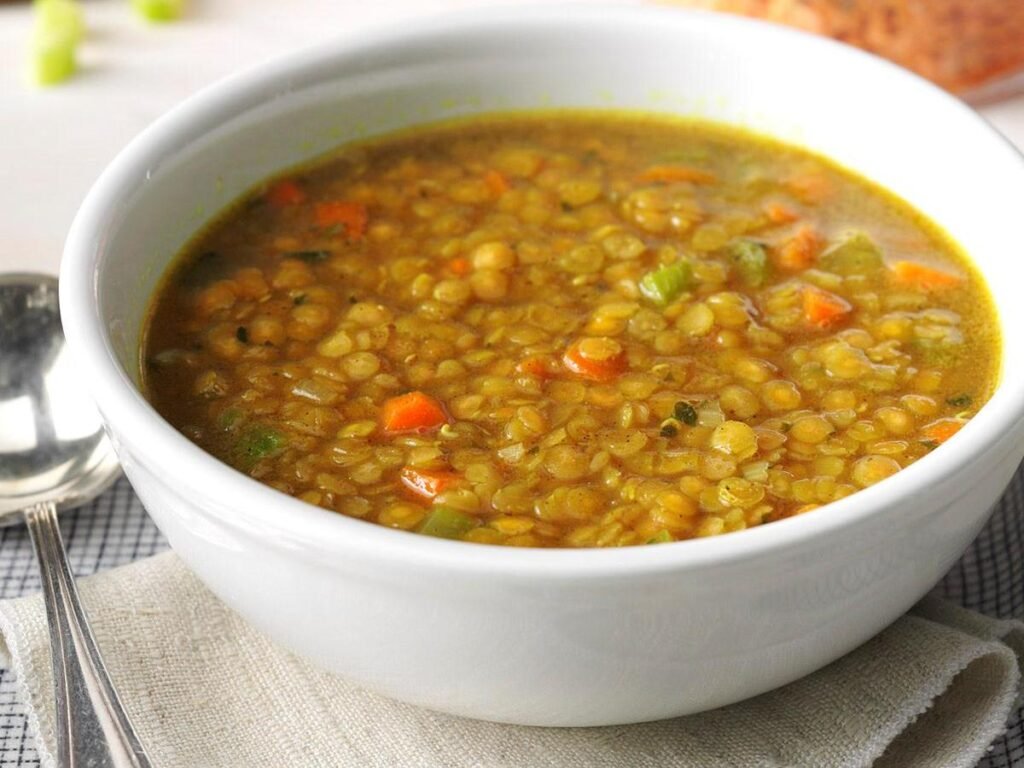 lentil soup with assorted veggies in bowl-kookybakes.com